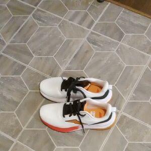 White and Orange Athletic Sneakers with Black Laces